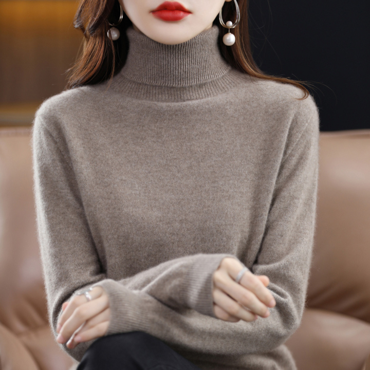 Versatile women's long sleeve turtleneck top, solid color, ideal for chic autumn and winter outfits.