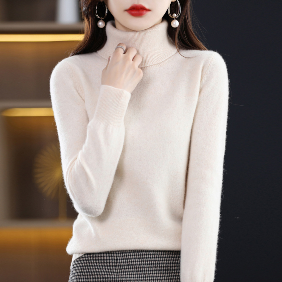 Elegant women's solid color turtleneck sweater, cozy and stylish, perfect for winter fashion.