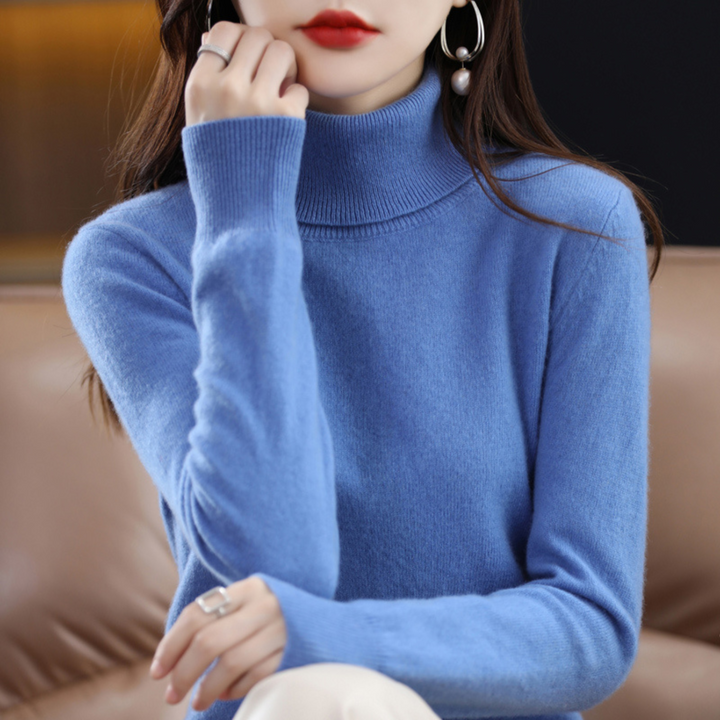 Stylish women's long sleeve turtleneck top in a solid color, ideal for autumn outfits.