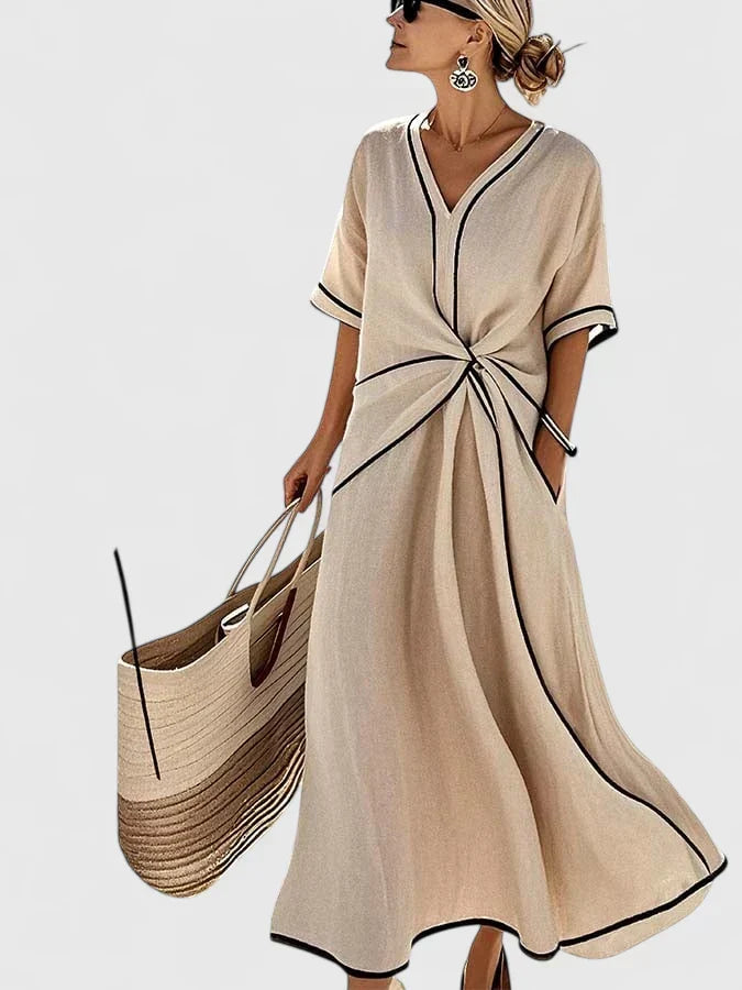 Versatile women's elegant maxi dress featuring a chic twist front, V-neck, short sleeves, and stylish contrast trim.