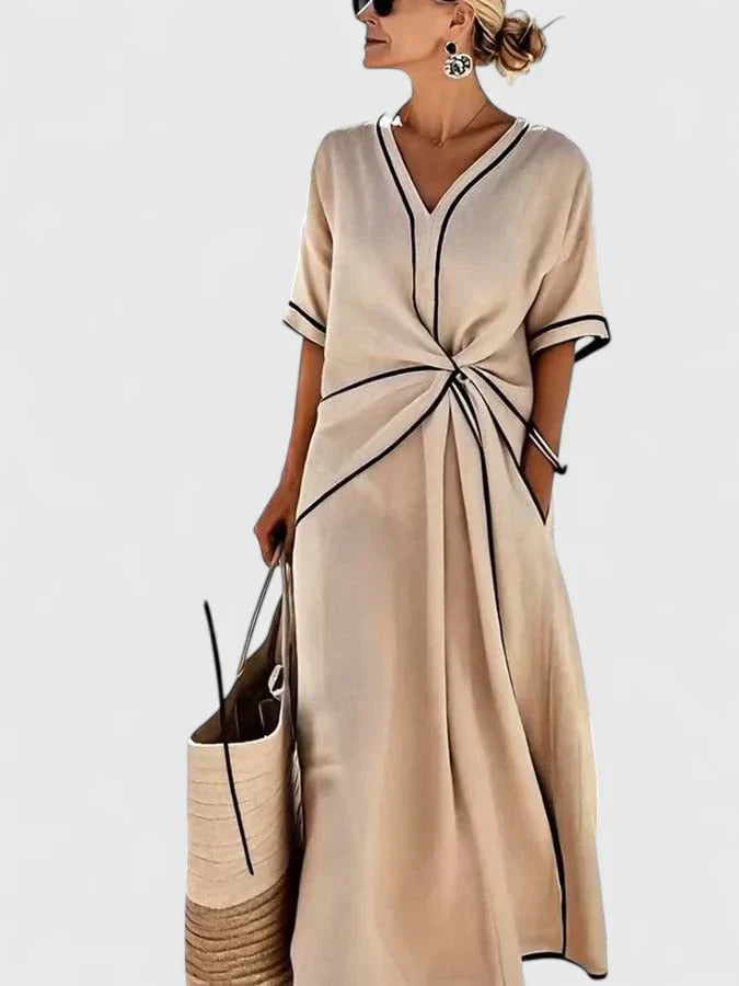 Women's elegant A-line maxi dress with a sophisticated twist front. Ideal as a summer dress or vacation wear.