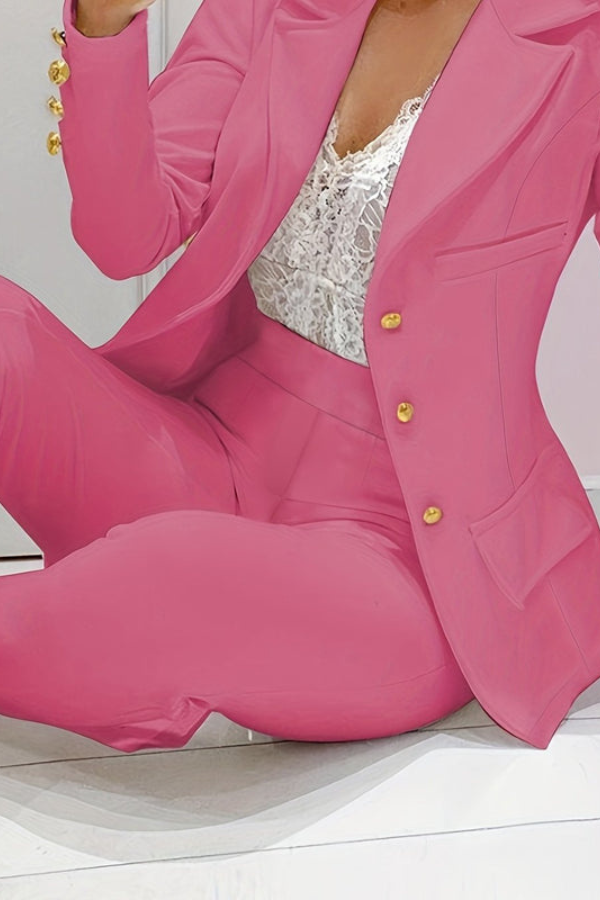 Elegant women's workwear suit: a sharp blazer paired with comfortable dress pants.
