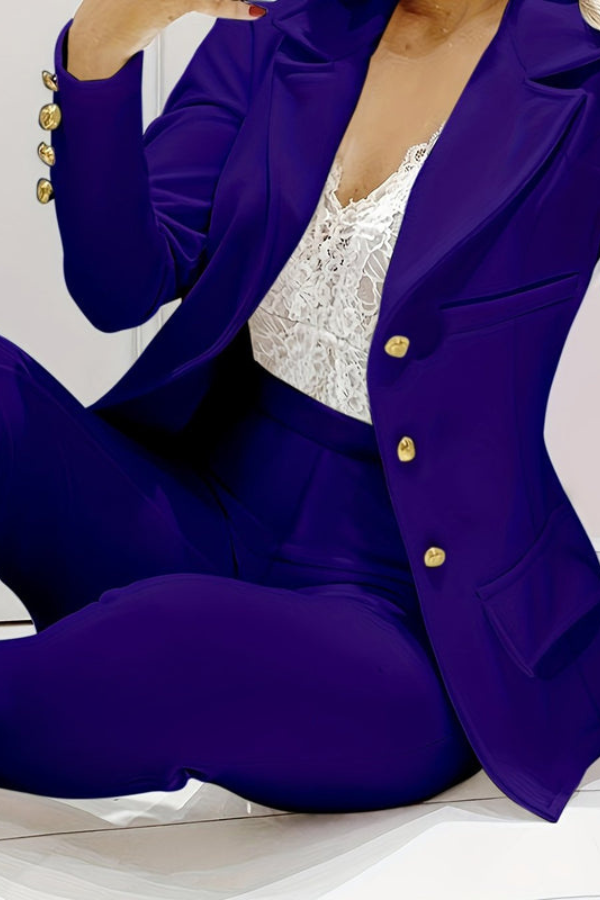 Stylish women's fashion suit: elegant blazer and matching dress pants for office attire.