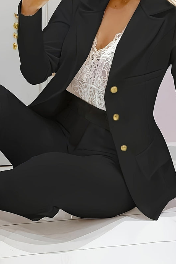 Contemporary women's two-piece professional suit, offering comfort & modern elegance.