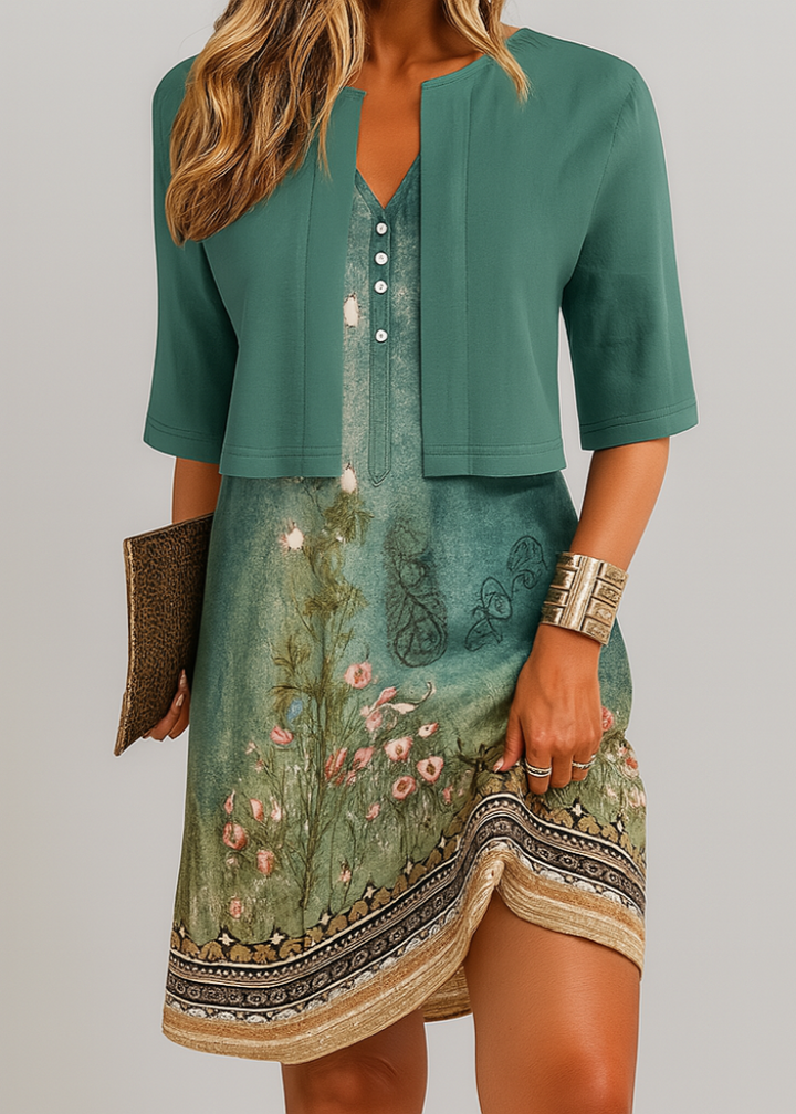 Fashionable women's two-piece summer dress. Elegant long A-line skirt and matching top. Coordinated set for chic style.