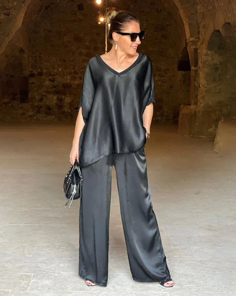 Versatile women's elegant two-piece pants set. Ideal for professional wear, spring outfits, or a chic coordinated look.