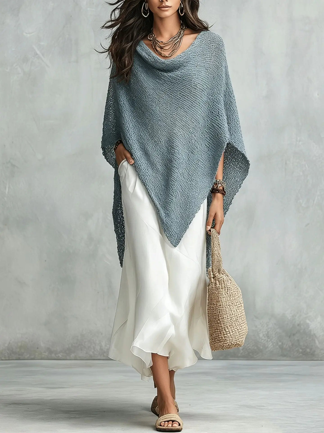 Elegant women's two-piece poncho maxi dress set. Versatile sleeveless dress with chic batwing top for spring/summer.