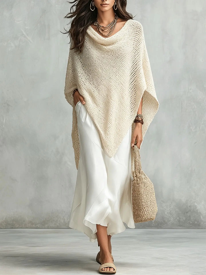 Chic women's sleeveless maxi dress, part of an elegant two-piece set with a matching poncho. Ideal for versatile fashion.