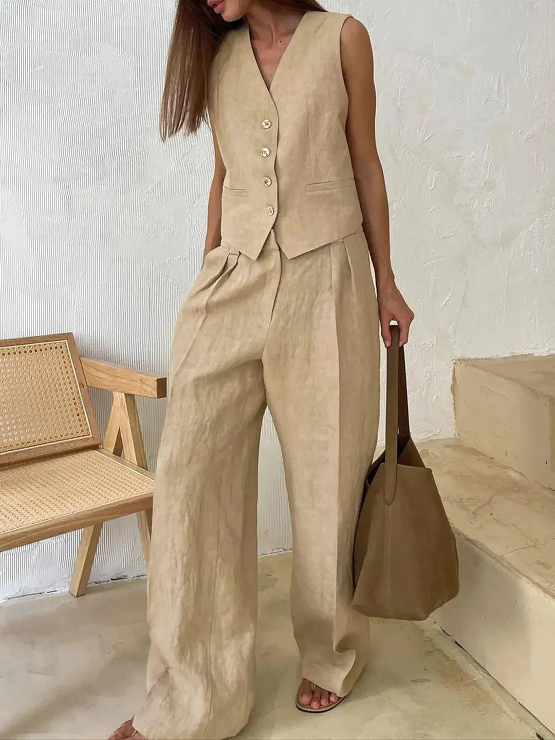 Stylish women's waistcoat & wide-leg trousers two-piece ensemble, ideal for elegant formal casual occasions.