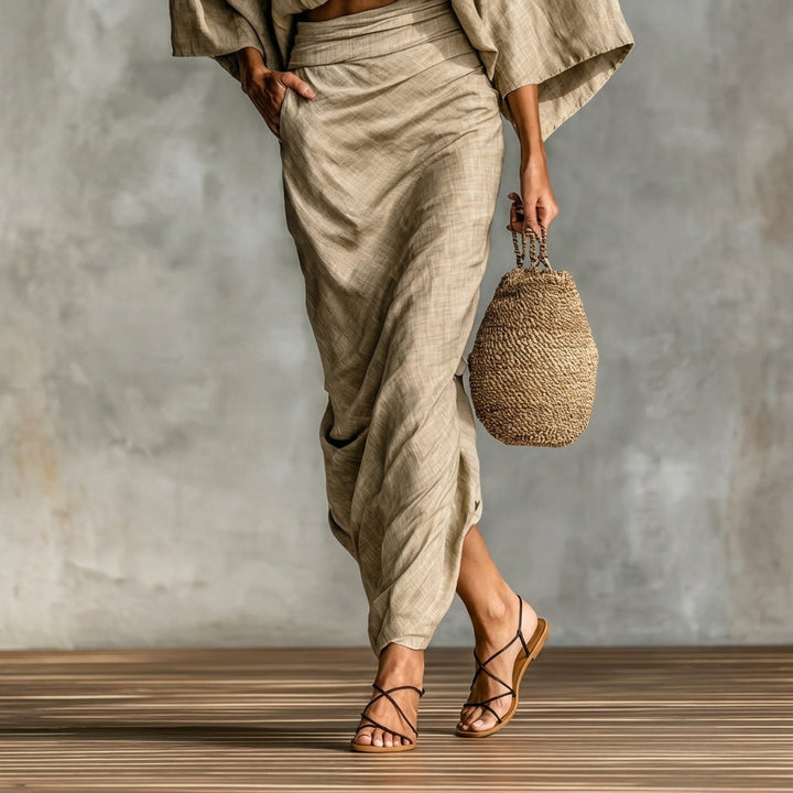 Stylish women's matching skirt set. Elegant two-piece for spring/summer fashion. Versatile & comfortable wear.