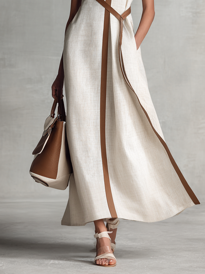 Beautiful women's elegant V-neck A-line maxi dress with contrast trim, a perfect summer wedding guest outfit.