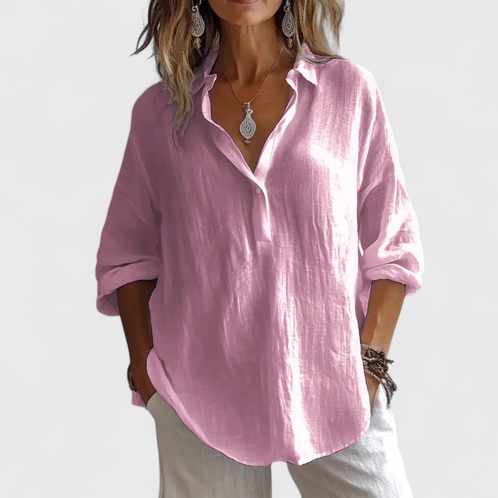 Elegant women's V-neck blouse, versatile for office or casual wear. Stylish and sophisticated spring fashion top.