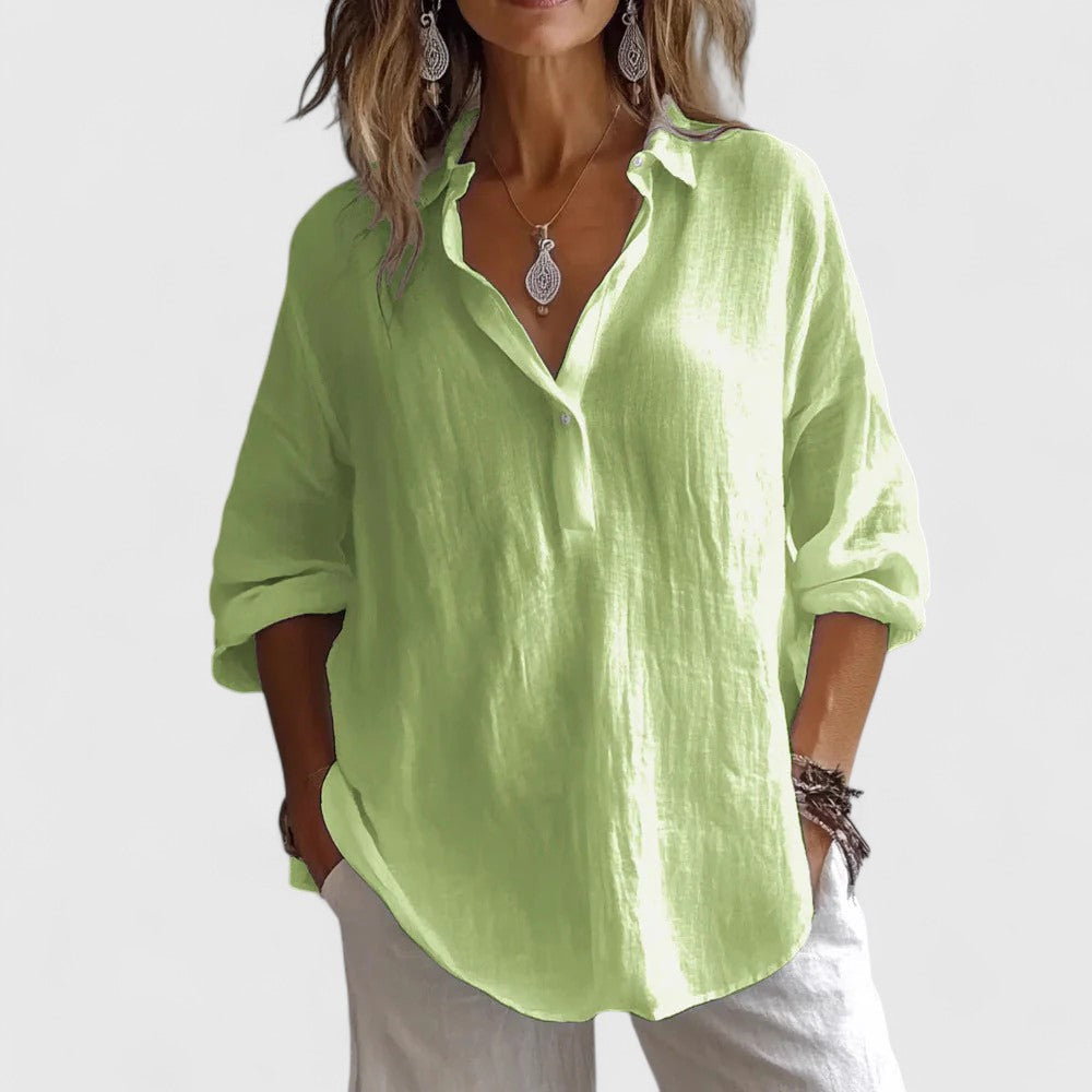 Stylish women's V-neck blouse, perfect for spring/summer. Versatile elegant top with a relaxed fit for any occasion.