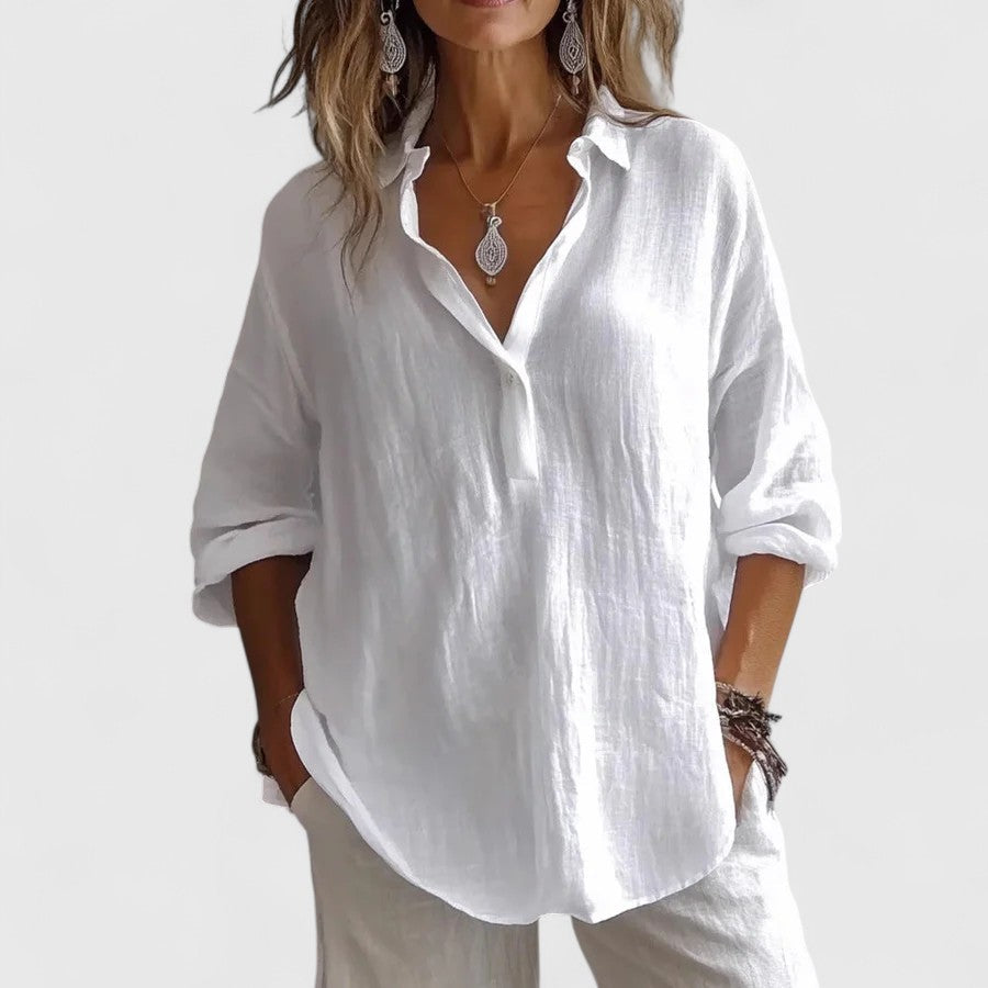 Casual chic women's V-neck blouse, elegant and stylish. Perfect summer top for a sophisticated, relaxed fit look.
