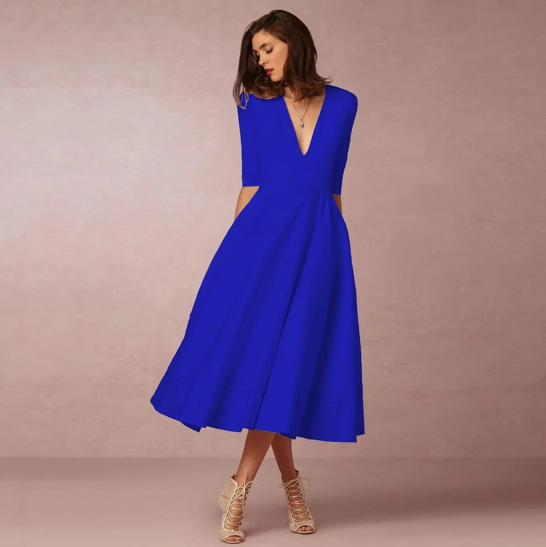 Women's elegant midi dress with a V-neck & elbow sleeves, offering timeless comfort & versatile style.