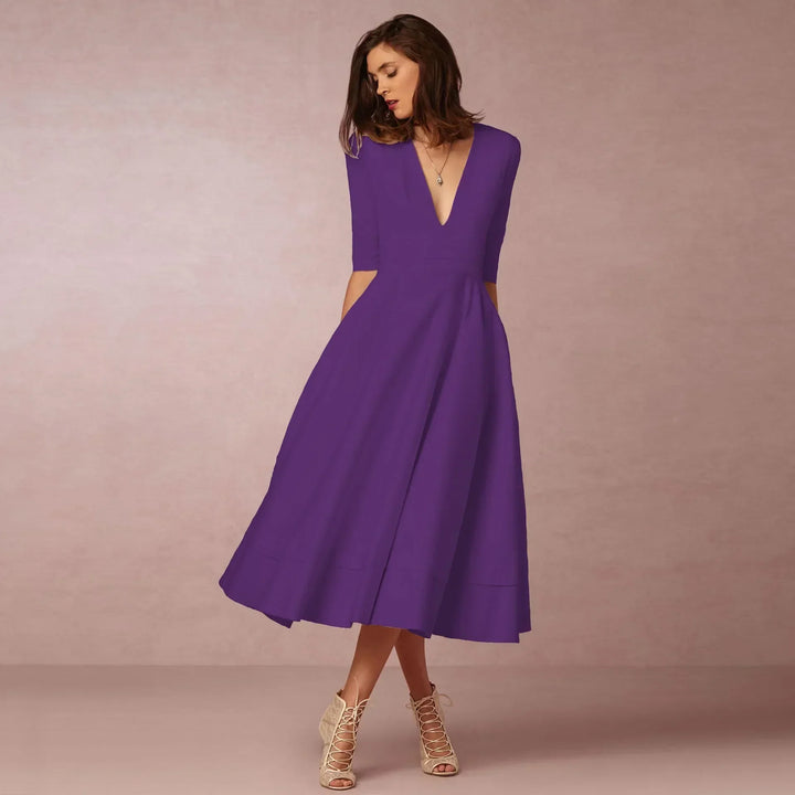 Day to night elegance: women's V-neck elbow-sleeve midi dress, perfect for any versatile occasion.
