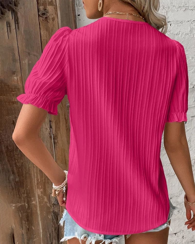 Stylish women's lace V-neck blouse, a delicate, long sleeve top. Elegant and comfortable, perfect for chic women's apparel.