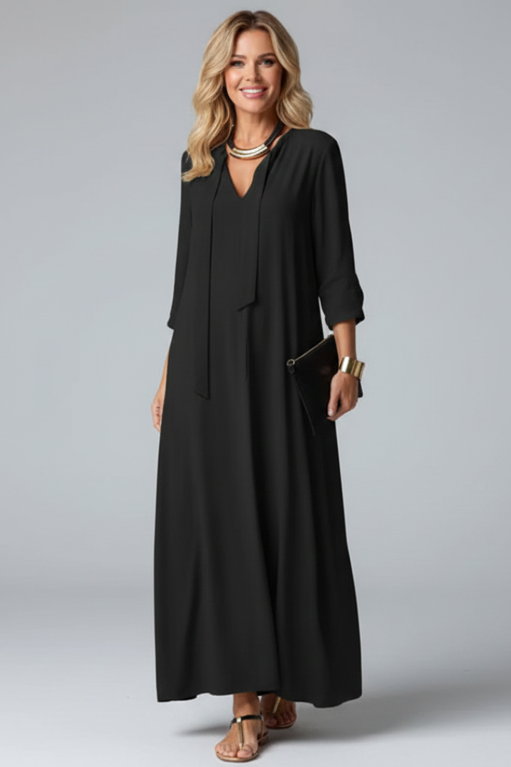 Graceful women's V-neck long sleeve maxi dress, an elegant choice for winter outfits.