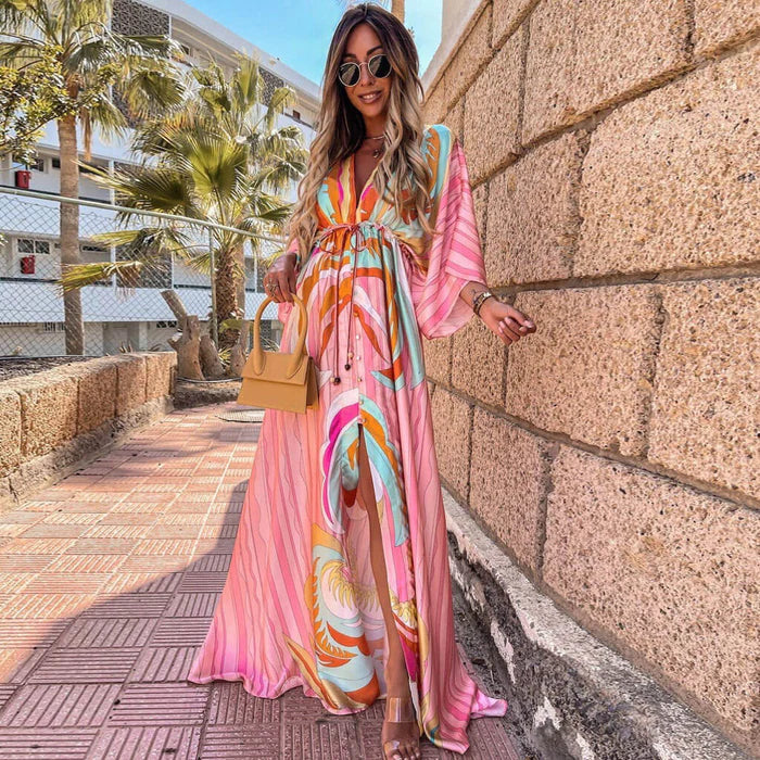 Elegant women's V-neck maxi dress with flowy kimono sleeves and a stylish high slit, perfect for summer evenings.