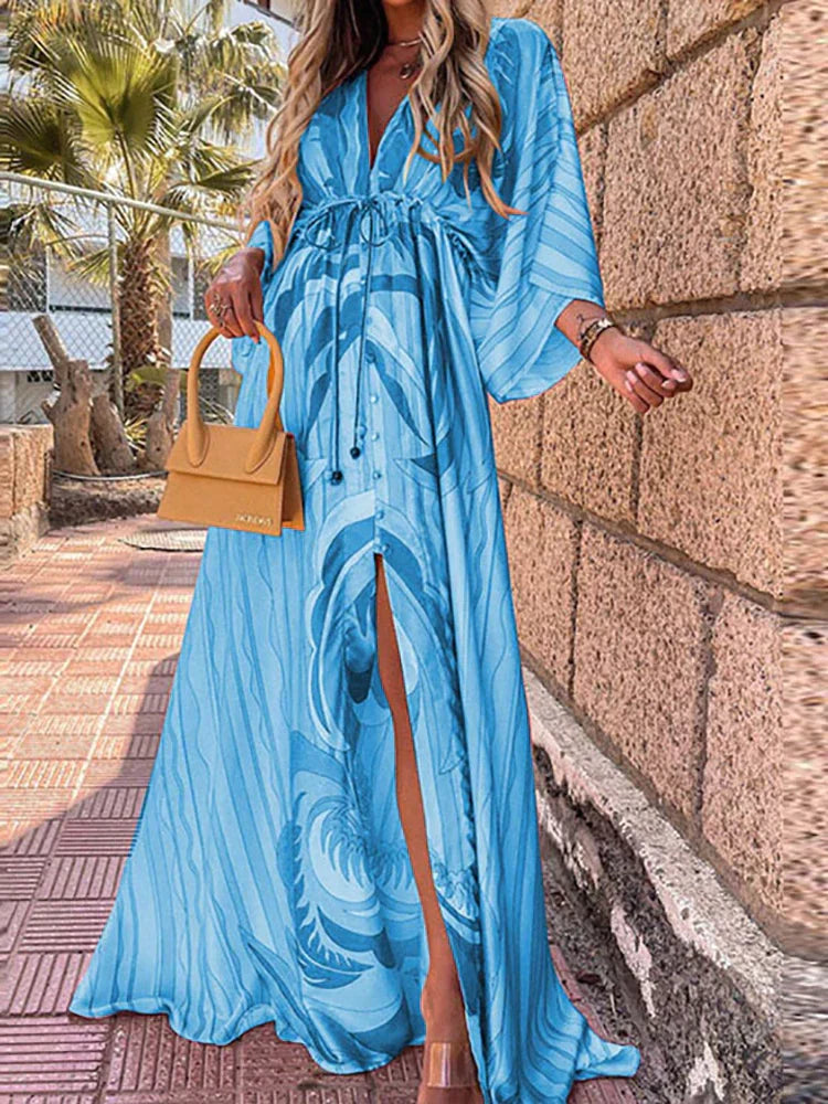 Flowy V-neck maxi dress for women, featuring chic kimono sleeves and a high slit, ideal for beach or evening wear.