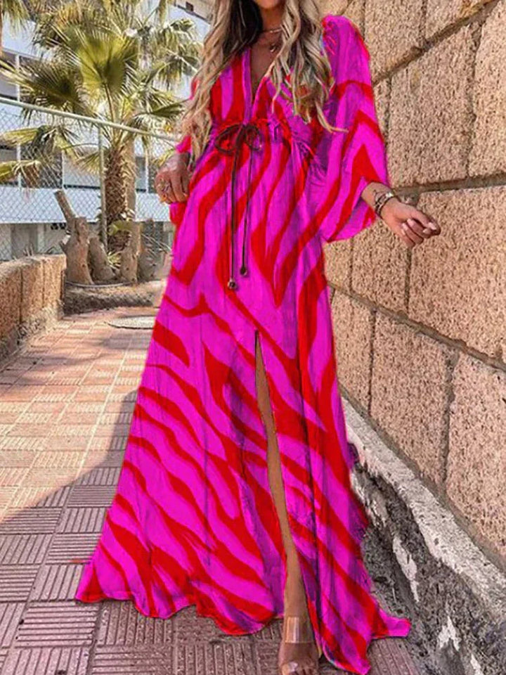 Comfortable women's long V-neck dress with unique kimono sleeves and a flattering high slit, great for warm weather.