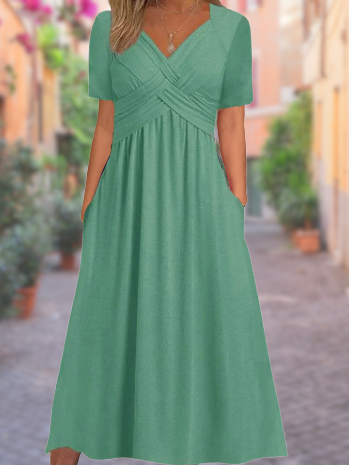 Versatile V-neck crisscross midi dress for women, suitable for casual summer days or elegant evening events.
