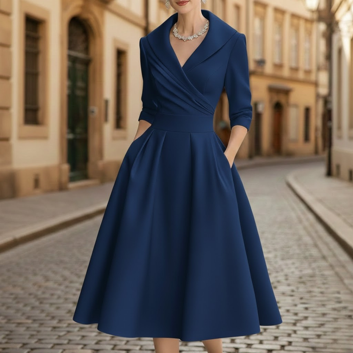 Stylish women's V-neck midi dress with three-quarter sleeves. Versatile fashion for casual, workwear, or elegant events.