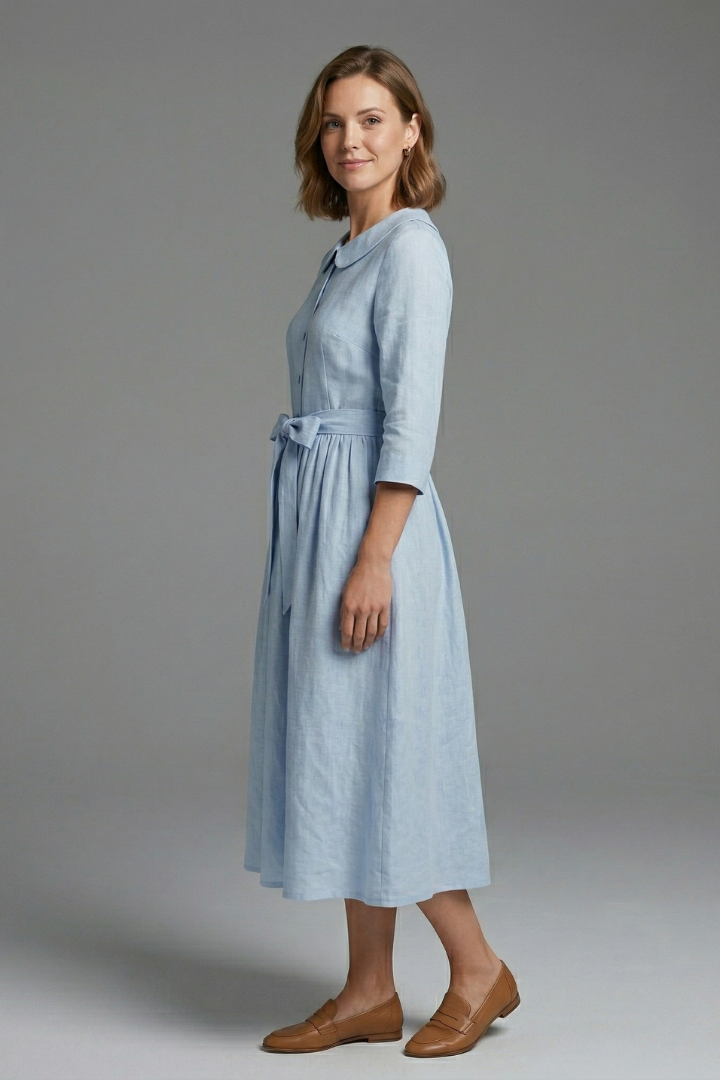 Detail of waist tie on women's midi dress, creating a flattering fit for versatile styling.