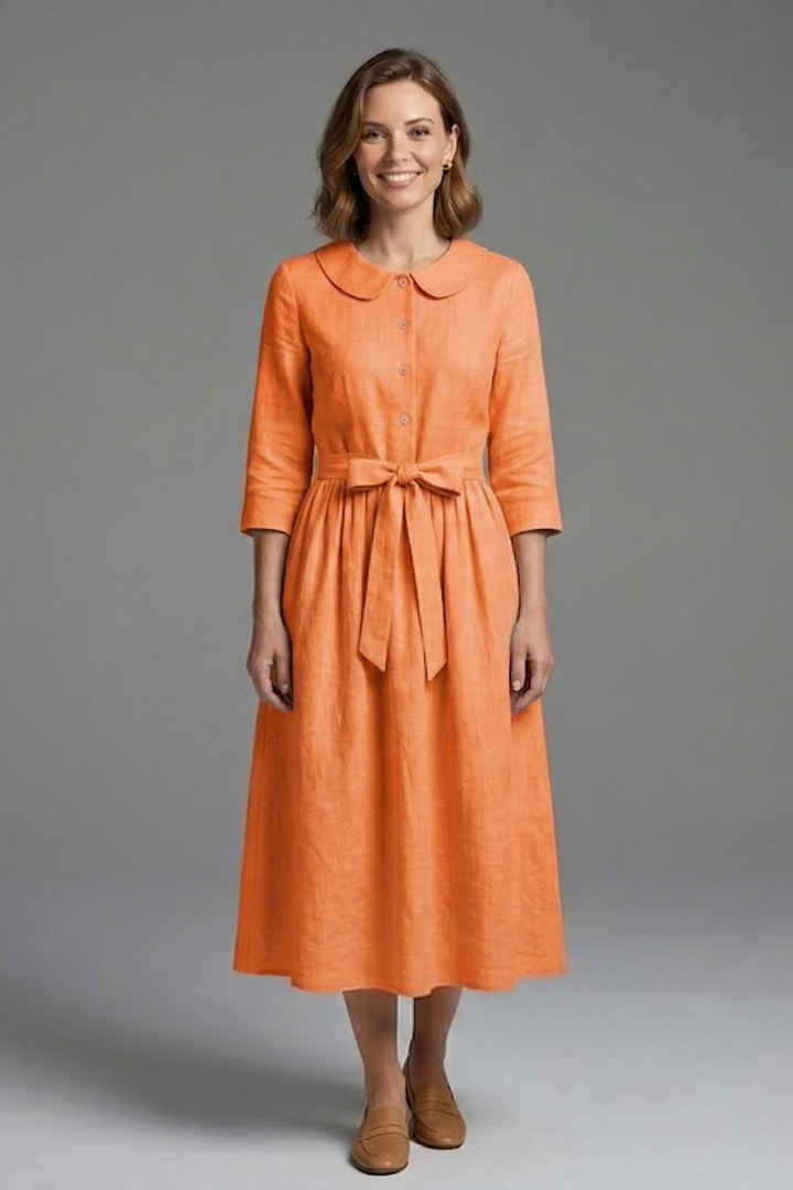 Professional woman in elegant V-neck midi dress, ideal office wear for a sophisticated look.
