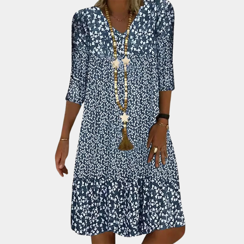 Elegant Women's V-neck midi summer dress with short sleeves, ideal for casual everyday wear or vacation. Flowy design.