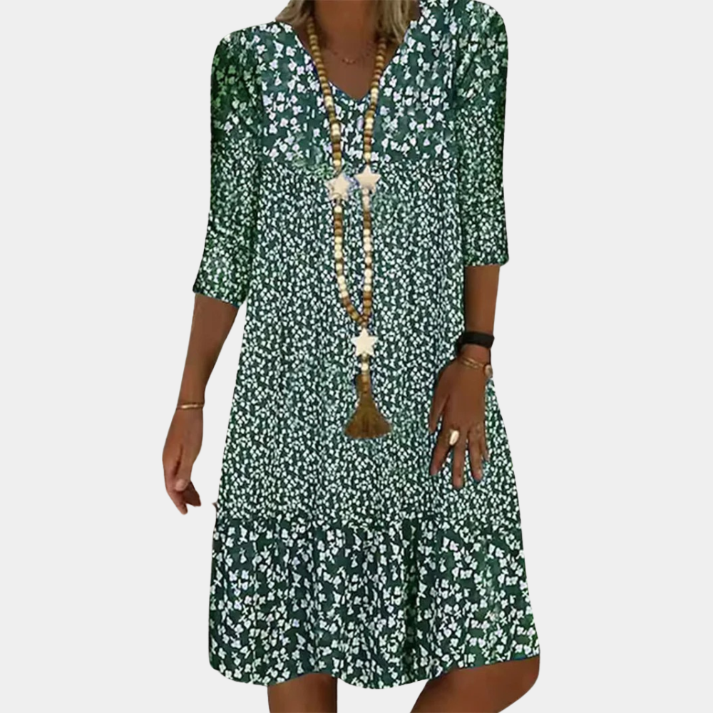 New women's elegant V-neck midi dress featuring short sleeves & a comfortable flowy fit. Stylish summer fashion.