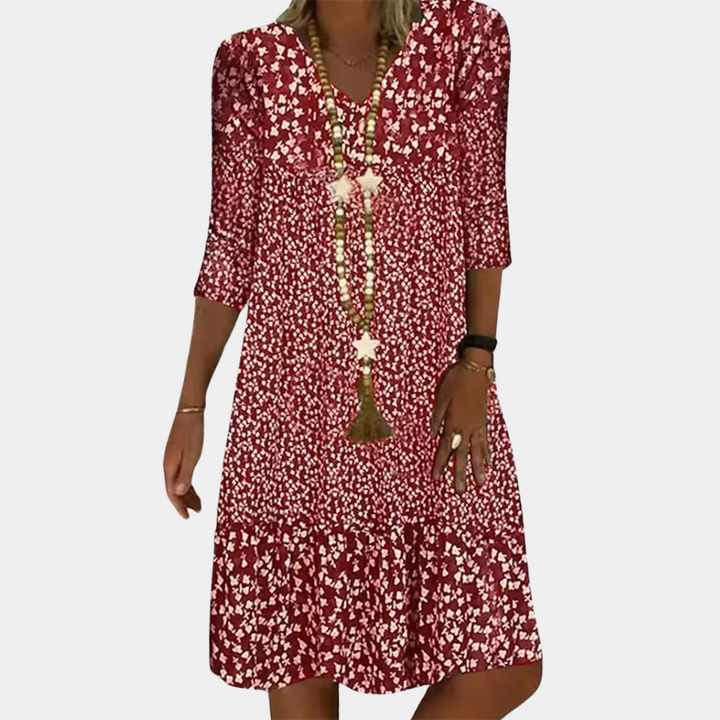 Ladies' versatile V-neck midi summer dress. Elegant short-sleeve flowy design, great for casual outings or vacation wear.