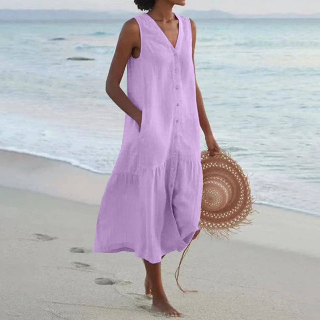 Women's elegant V-neck midi sundress, perfect for summer comfort. Flowing design, great casual vacation wear.