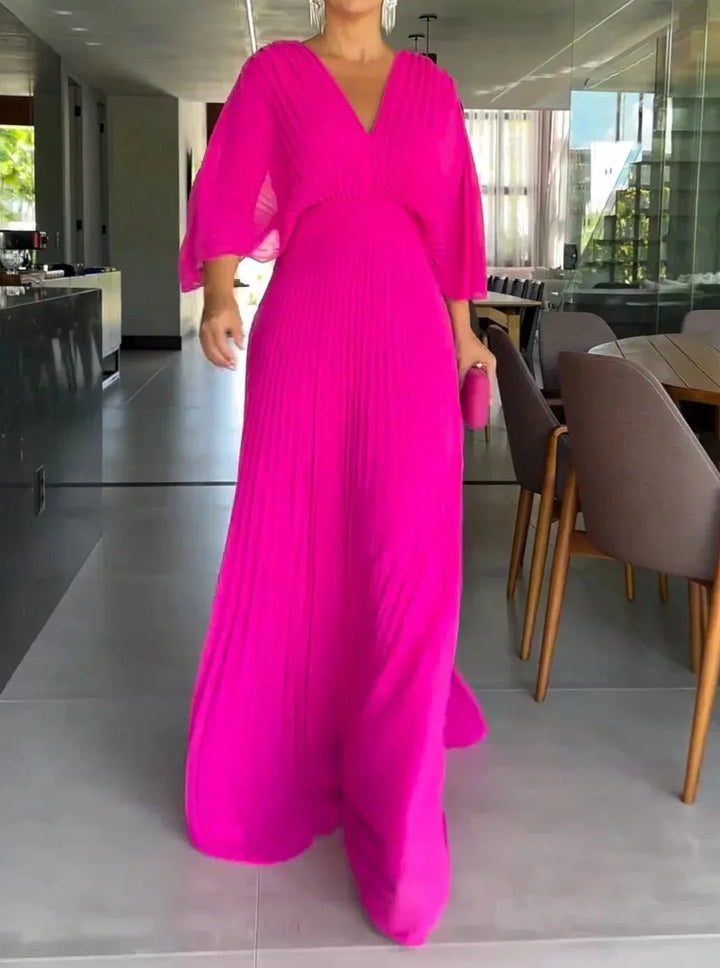 Discover this elegant women's V-neck pleated kaftan maxi dress. Perfect long summer occasion wear.