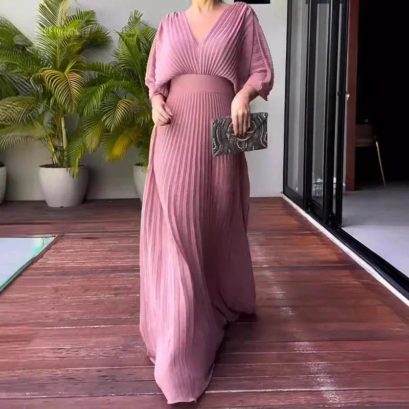 Embrace elegance in this women's V-neck pleated kaftan maxi dress. Flowy design for stylish summer events.