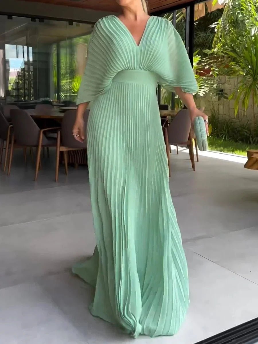 Beautiful women's elegant V-neck pleated maxi dress. Comfortable kaftan style, great for summer fashion.