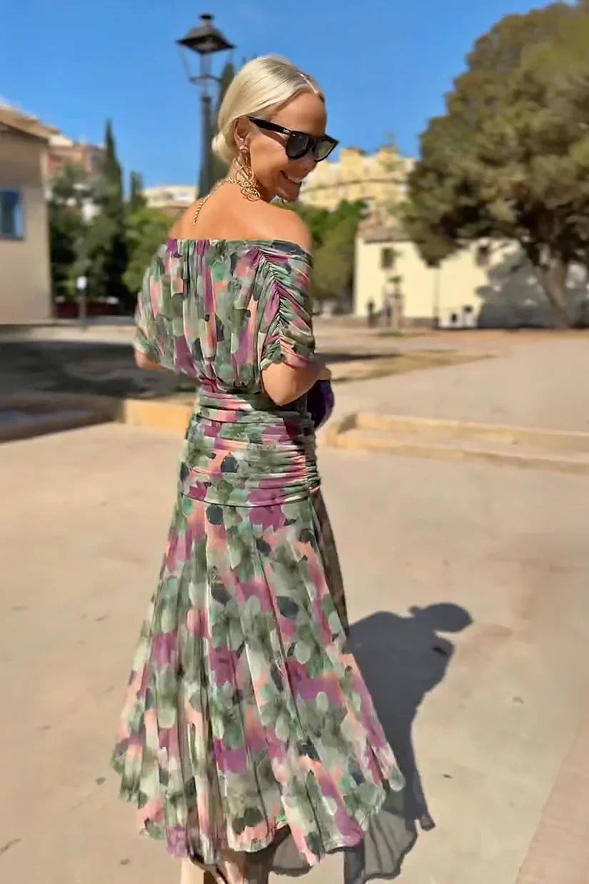 Lightweight pleated V-neck maxi dress, elegant & comfy for summer weddings & evening events.