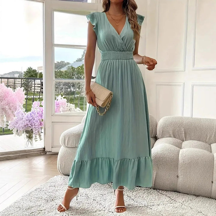 Elegant women's V-neck ruffle maxi dress, flowy fabric perfect for summer events & comfortable all-day wear.