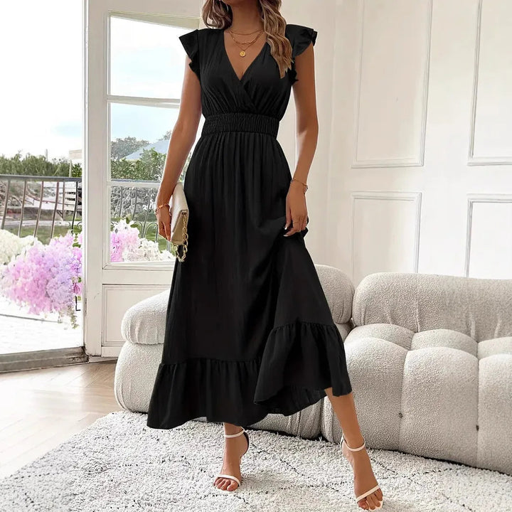 Versatile women's flowy V-neck maxi dress with ruffle trim, ideal for elegant evening wear or casual spring outings.