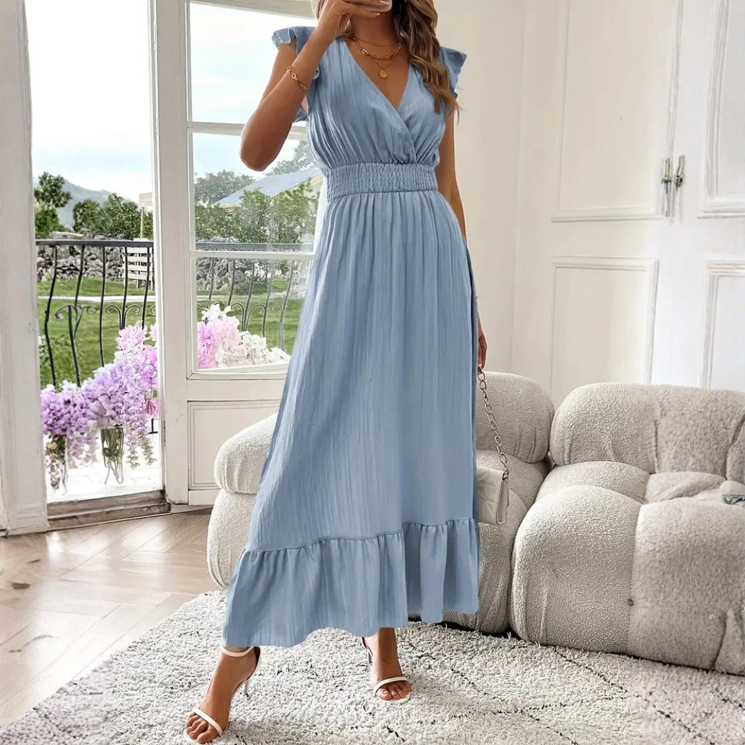 Women's chic V-neck maxi dress with delicate ruffle trim, offering elegant flow and comfort for spring & summer fashion.
