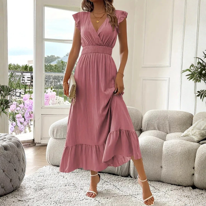 Lightweight women's V-neck ruffle maxi dress, perfect for summer comfort and elegant spring fashion. Flowy design.