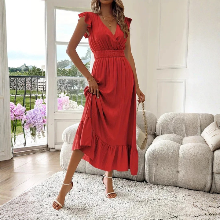 Close-up of elegant women's V-neck ruffle maxi dress, highlighting the flowy fabric and sophisticated design.