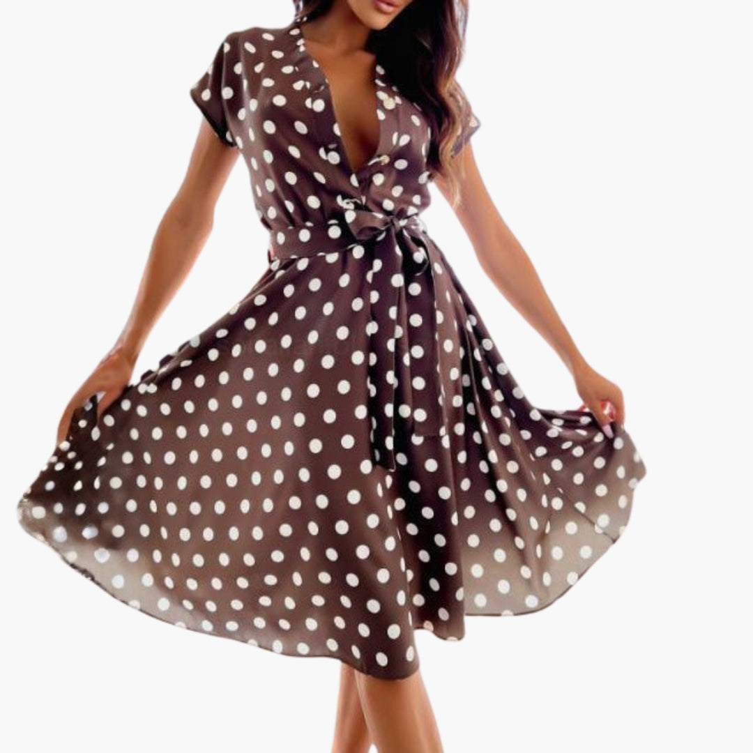 Chic women's short sleeve V-neck midi dress, offering effortless elegance for spring and summer occasions.
