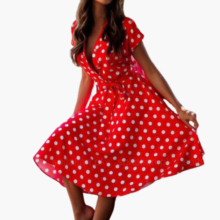 Stylish women's midi dress featuring a flattering V-neck and short sleeves for a sophisticated look.