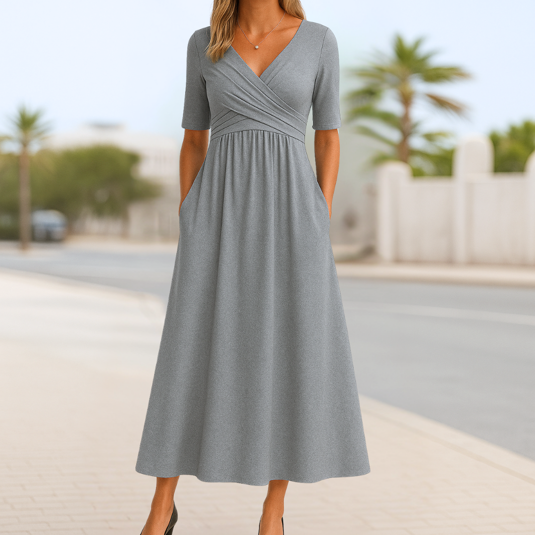 Chic women's V-neck short sleeve midi dress, offering an elegant and comfortable fit for various occasions.