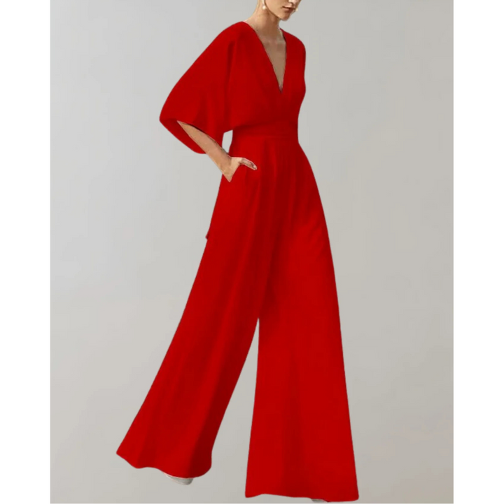 Effortless flow women's V-neck wide leg jumpsuit. Comfortable, stylish, modern fashion formal wear.