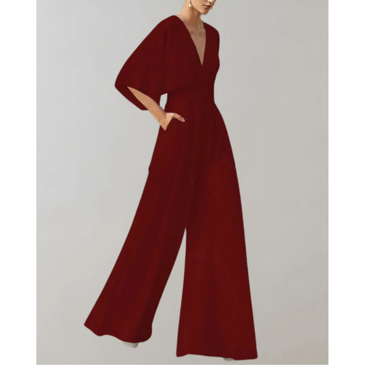 Sophisticated women's V-neck wide leg jumpsuit. Elegant formal one-piece outfit for parties.