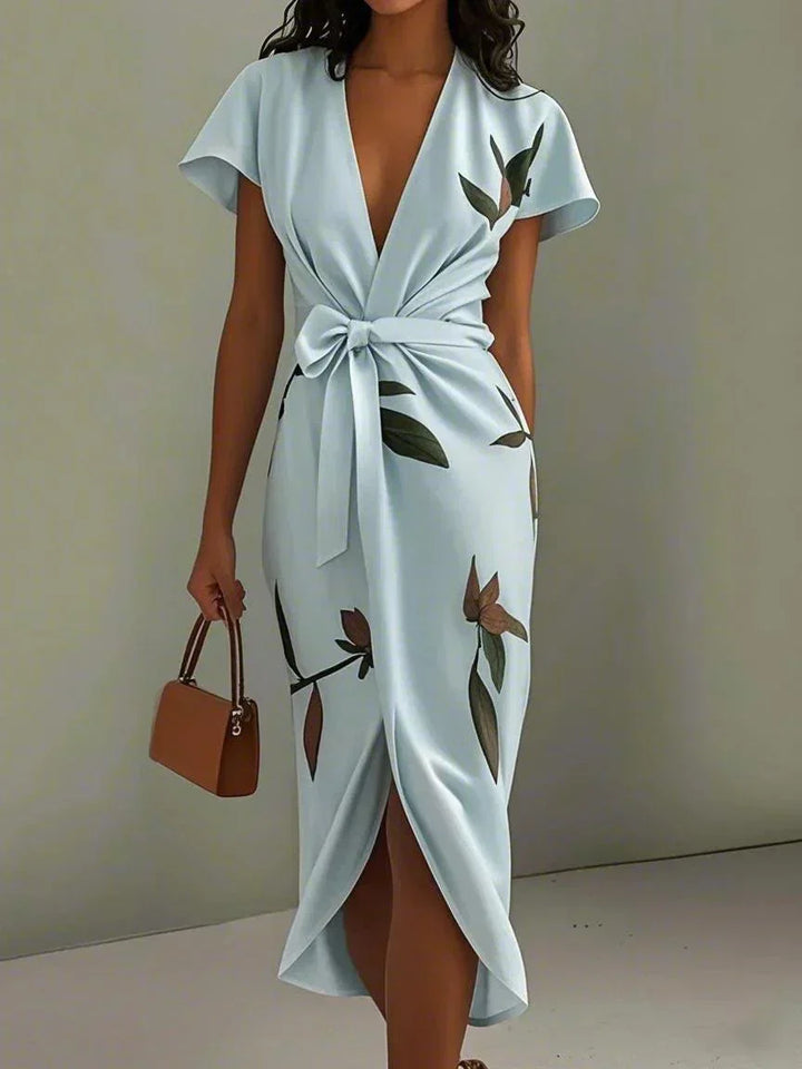 Women's printed V-neck wrap midi dress, ideal as a wedding guest or special occasion party dress.