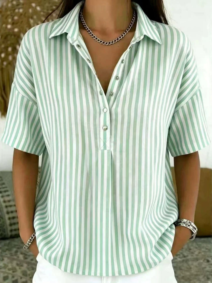 Elegant women's vertical stripe half-button blouse, relaxed fit, perfect for office chic or casual spring style.