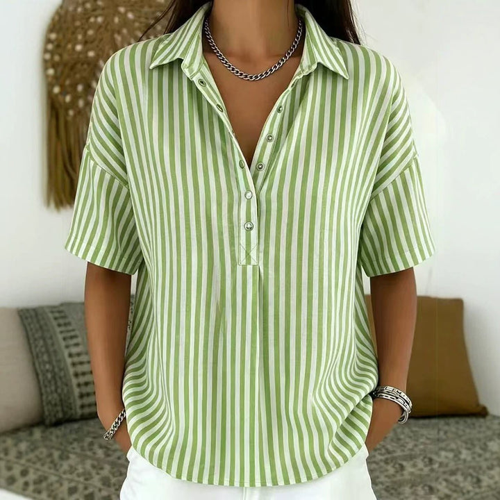 Stylish women's vertical stripe blouse with half-button front, a versatile top for summer fashion & office wear.